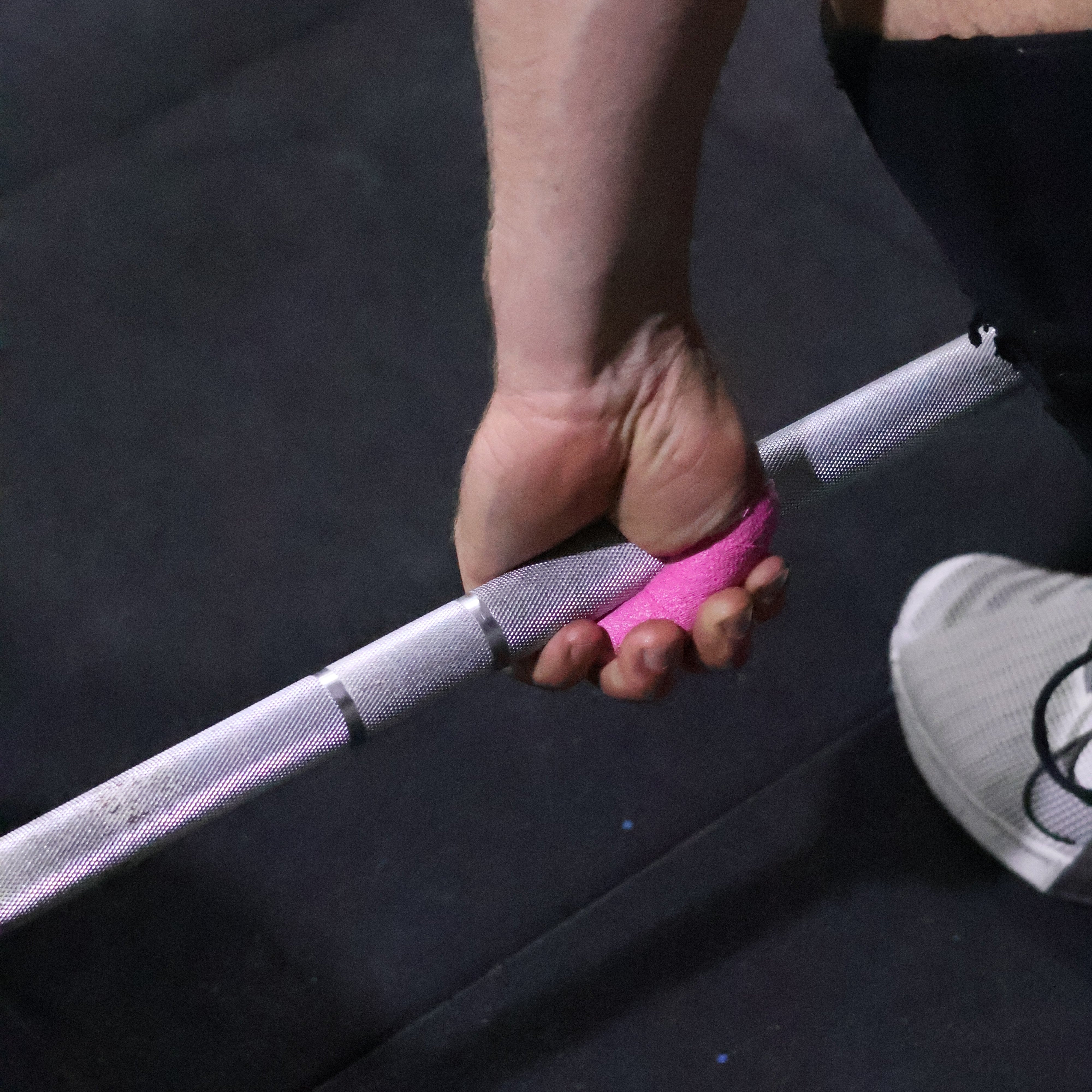Grip+ Grip Thumb Tape pink barbell hook grip setup for cleans