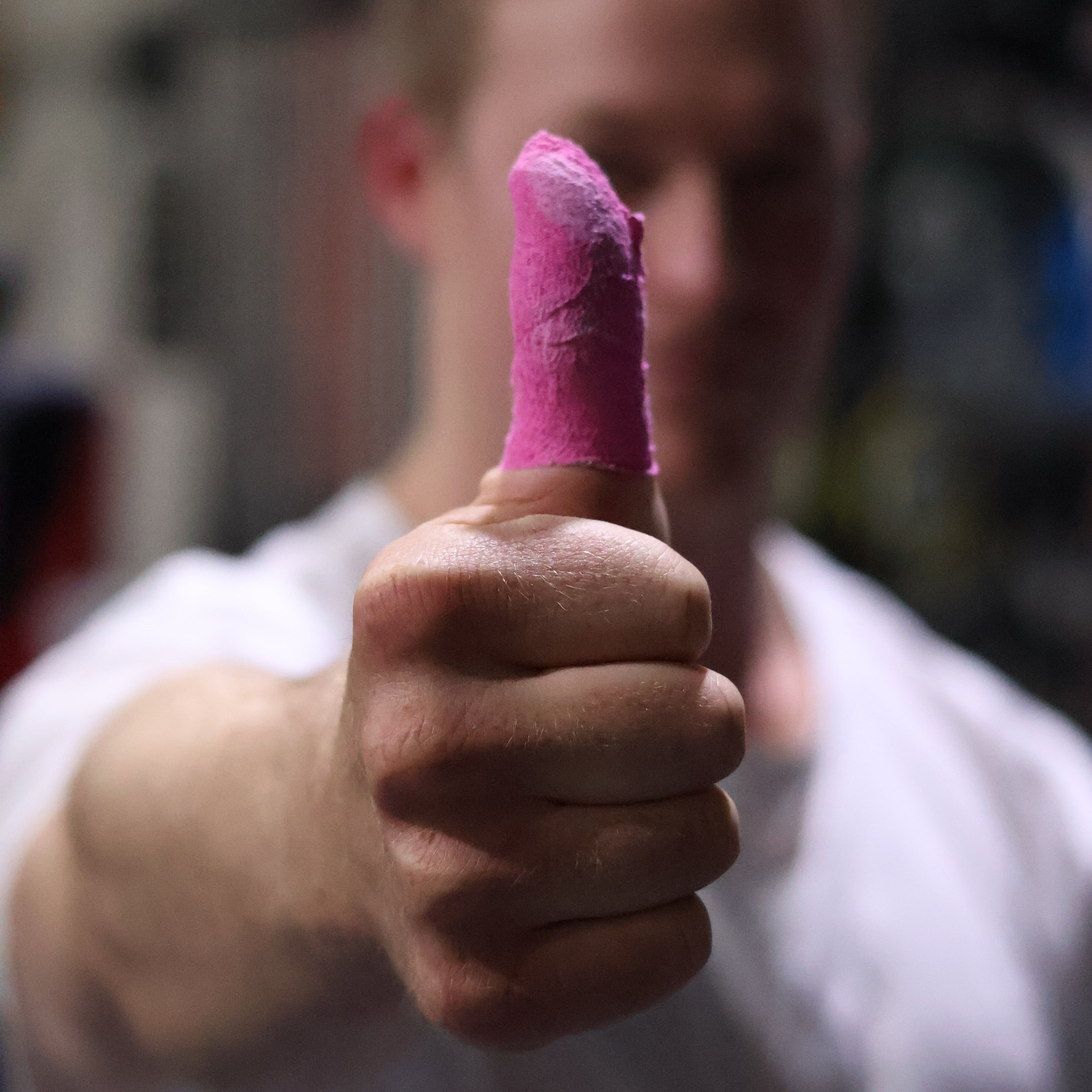 Grip+ Grip Thumb Tape pink thumbs up