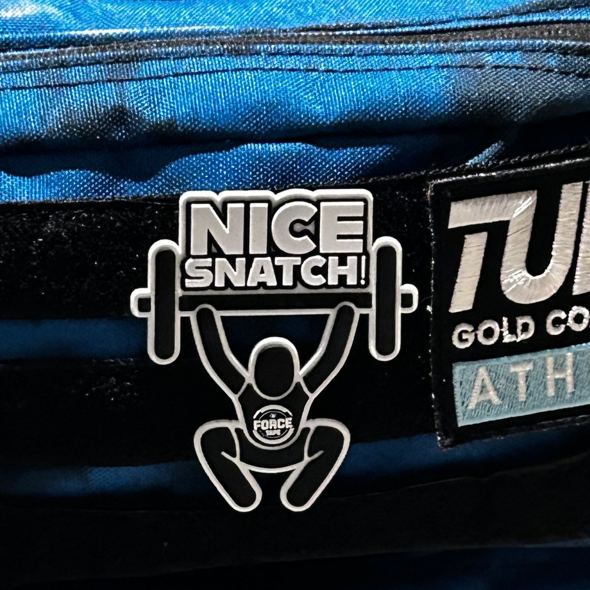 Nice Snatch gym bag patch on display