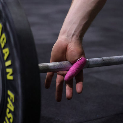 Grip+ Grip Thumb Tape pink barbell hook grip setup