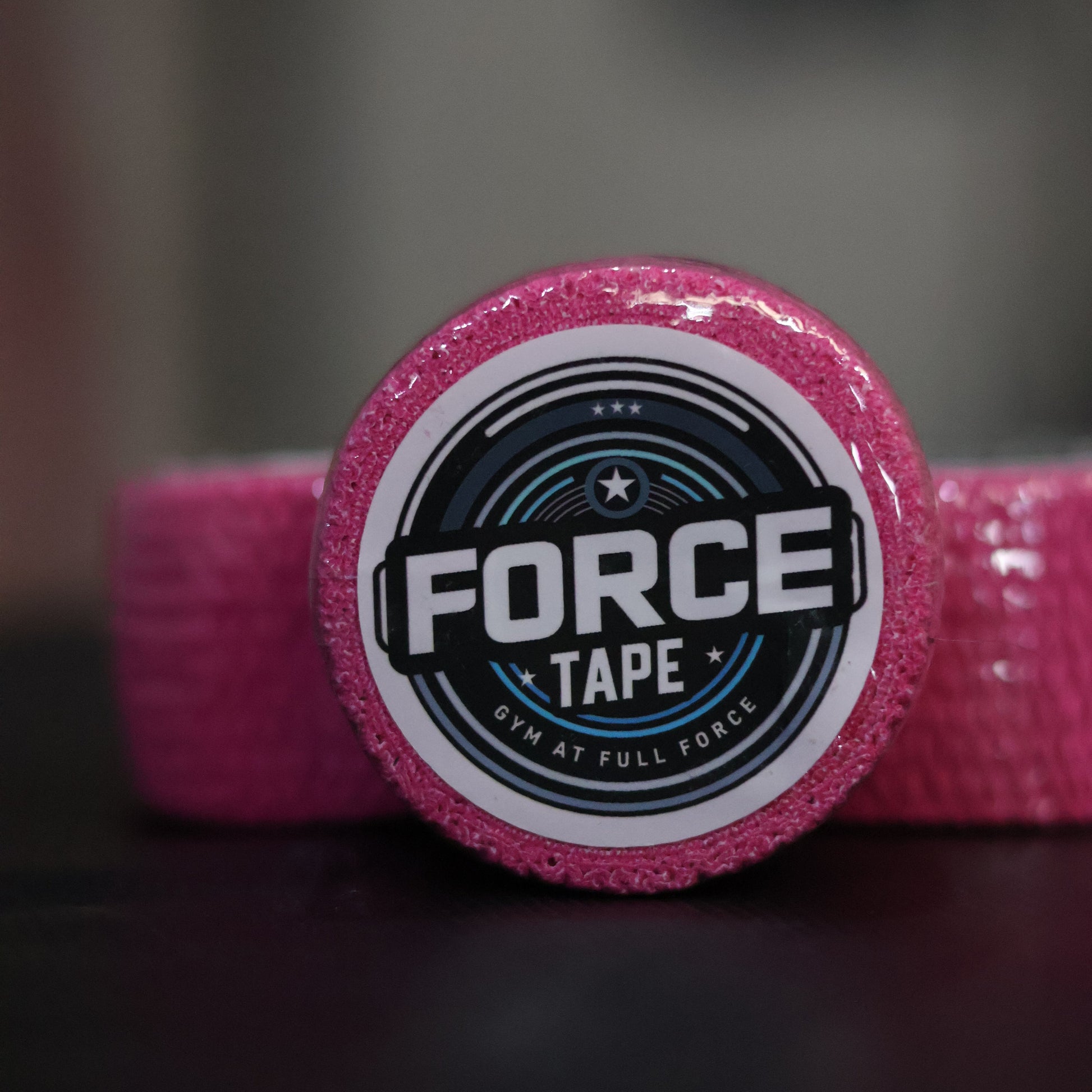 Grip+ Hook Grip Weightlifting Thumb Tape By Gym Stack close pink tape focus square