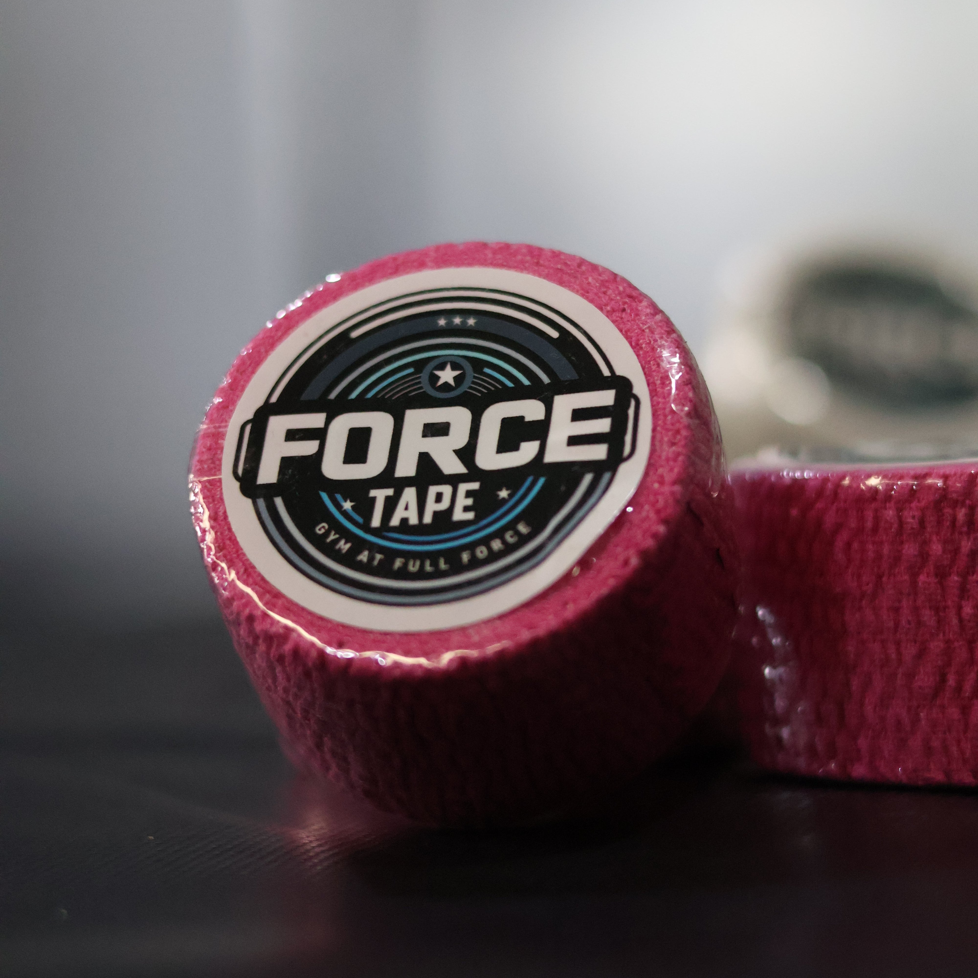 Grip+ Hook Grip Weightlifting Thumb Tape By Gym Stack close pink tape focus square top side